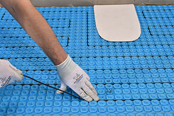 The Prodeso membrane for heating cable floor heating systems.